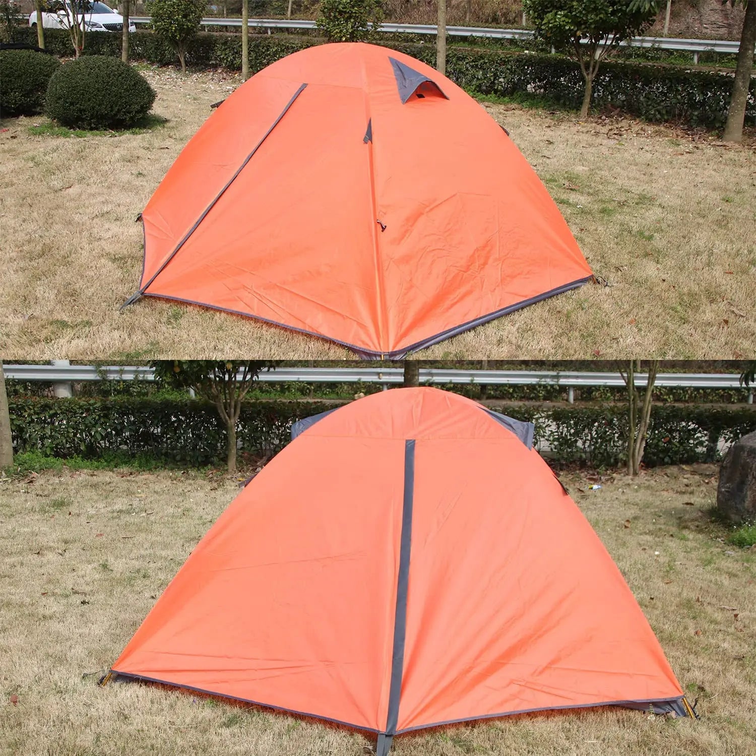 Orange tent on grass with trees in the background
